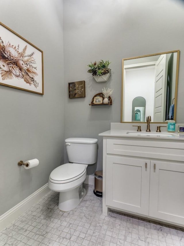 6656 Windfall Dr, Fort Worth, TX 76135 - half bathroom with toilet, vanity, and baseboards