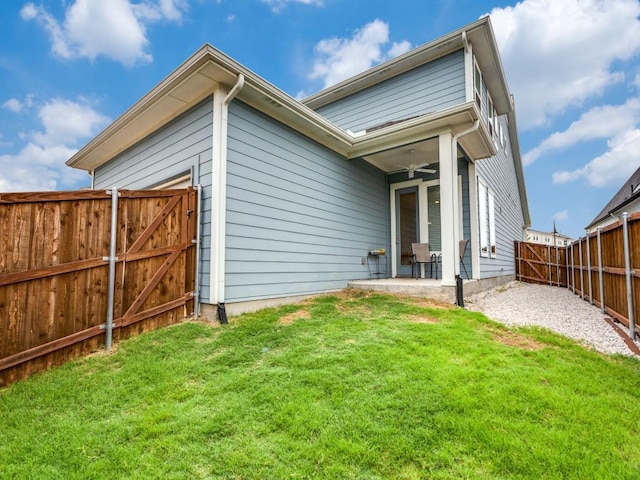 6656 Windfall Dr, Fort Worth, TX 76135 - back of property featuring a gate, a patio, and ceiling fan