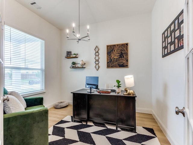 6656 Windfall Dr, Fort Worth, TX 76135 - office space with light wood finished floors, a chandelier, and baseboards