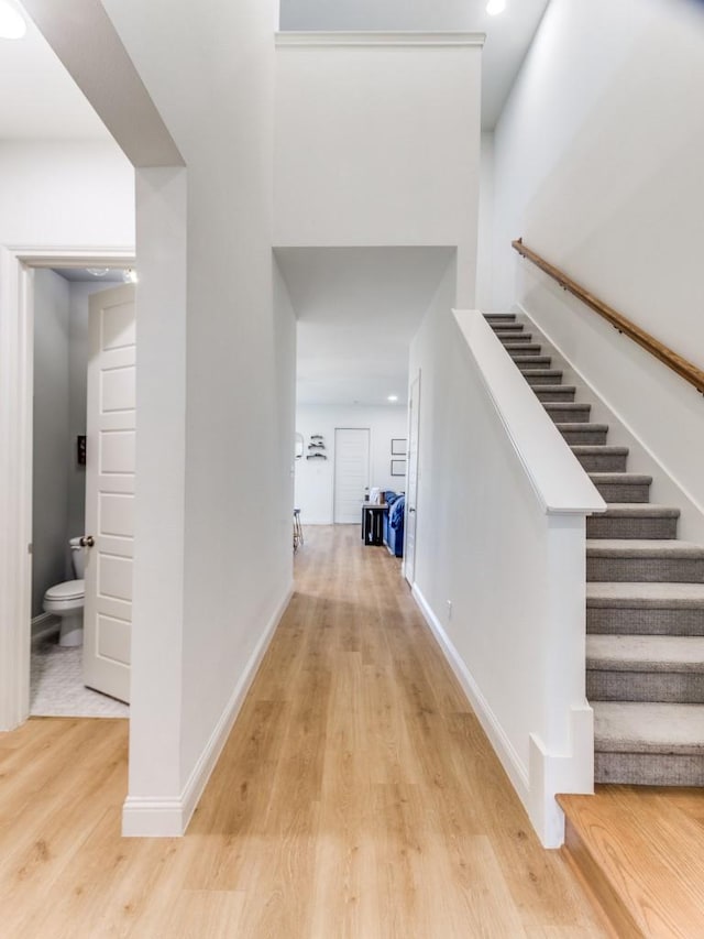 6656 Windfall Dr, Fort Worth, TX 76135 - corridor with light wood-style floors, stairs, baseboards, and recessed lighting