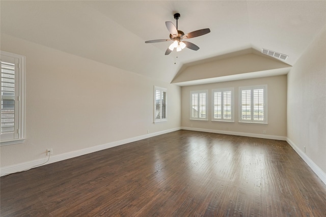 1207 Glasbury Glen Way, Forney, TX 75126 - empty room with ceiling fan, dark wood finished floors, lofted ceiling, and baseboards