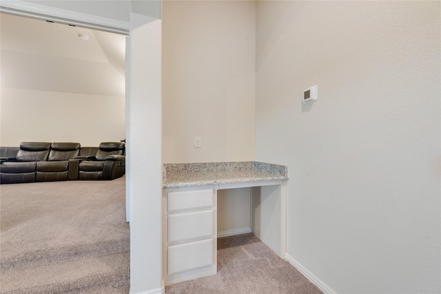 1207 Glasbury Glen Way, Forney, TX 75126 - interior space featuring carpet floors, built in study area, and baseboards