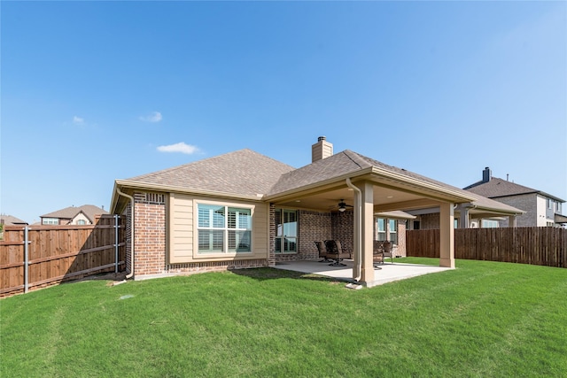 1207 Glasbury Glen Way, Forney, TX 75126 - rear view of house with a ceiling fan, brick siding, a patio, and a chimney