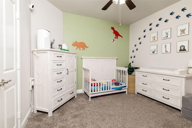 1225 Lynn Dr, Arlington, TX 76002 - bedroom featuring light colored carpet, a nursery area, and ceiling fan
