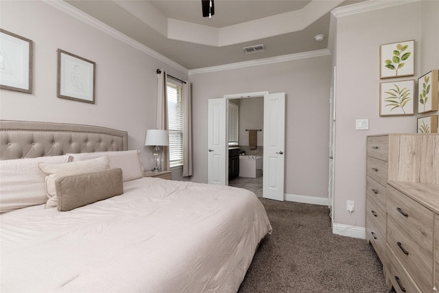 1225 Lynn Dr, Arlington, TX 76002 - bedroom featuring a raised ceiling, dark colored carpet, crown molding, and ensuite bathroom