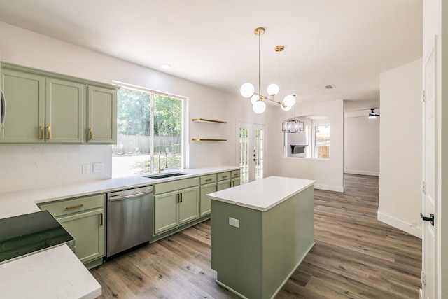 7205 Coventry Cir, North Richland Hills, TX 76182 - kitchen featuring green cabinets, stainless steel dishwasher, a sink, a kitchen island, and light countertops