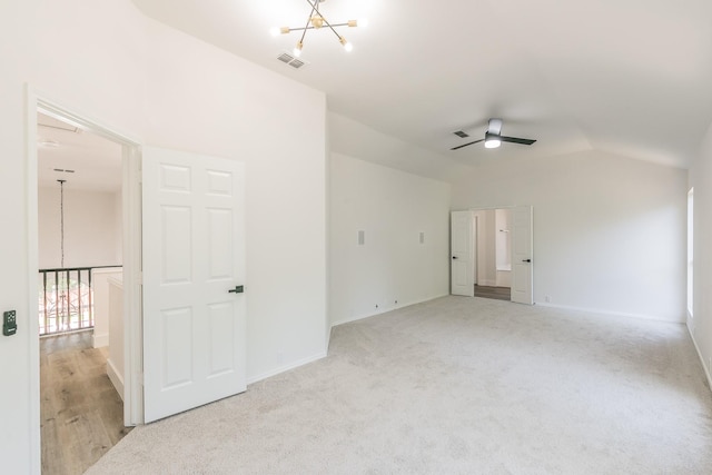 7205 Coventry Cir, North Richland Hills, TX 76182 - spare room with a chandelier, lofted ceiling, a ceiling fan, baseboards, and carpet floors