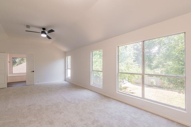 7205 Coventry Cir, North Richland Hills, TX 76182 - carpeted spare room featuring ceiling fan, lofted ceiling, healthy amount of natural light, and baseboards