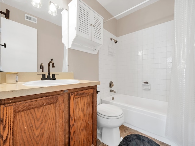 9170 Forest Ln Unit 228, Dallas, TX 75243 - bathroom featuring shower / bathtub combination with curtain, vanity, and toilet