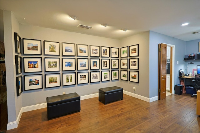 312 W Pleasantview Dr, Hurst, TX 76054 - living area with wood finished floors and baseboards