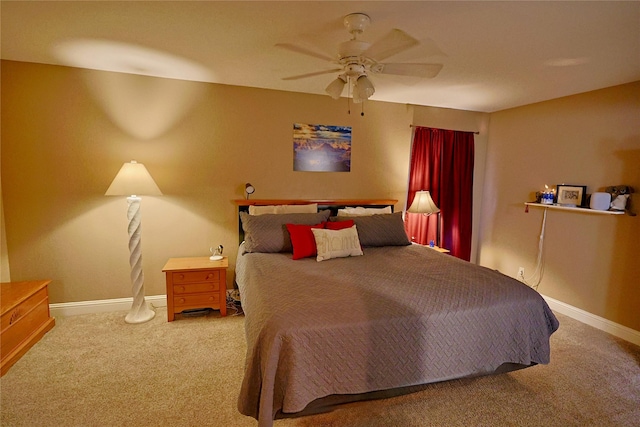 312 W Pleasantview Dr, Hurst, TX 76054 - carpeted bedroom with baseboards and a ceiling fan