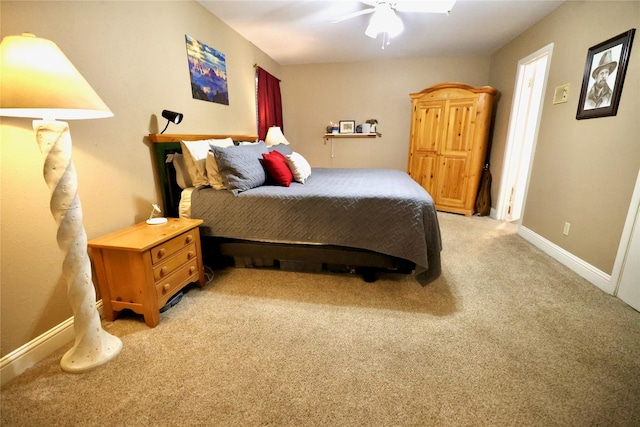 312 W Pleasantview Dr, Hurst, TX 76054 - bedroom with light colored carpet, baseboards, and a ceiling fan