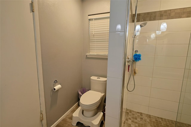 312 W Pleasantview Dr, Hurst, TX 76054 - bathroom featuring a stall shower and toilet