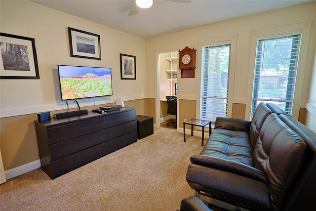 312 W Pleasantview Dr, Hurst, TX 76054 - carpeted living room featuring ceiling fan and baseboards