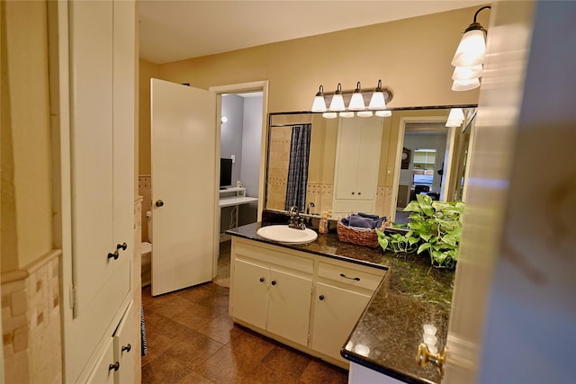 312 W Pleasantview Dr, Hurst, TX 76054 - bathroom featuring vanity and toilet