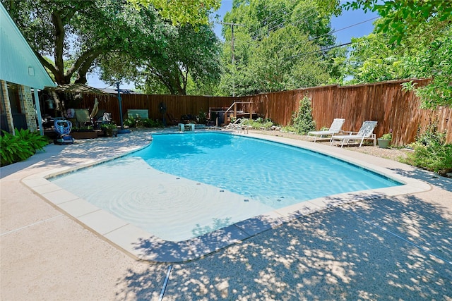312 W Pleasantview Dr, Hurst, TX 76054 - view of swimming pool featuring a patio and a fenced backyard
