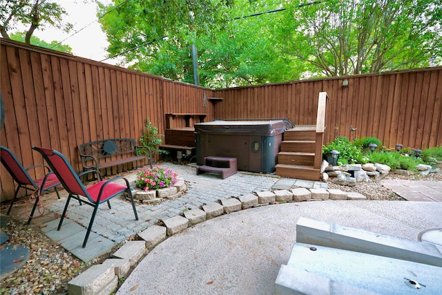 312 W Pleasantview Dr, Hurst, TX 76054 - view of patio / terrace featuring a hot tub