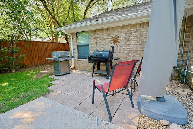 312 W Pleasantview Dr, Hurst, TX 76054 - view of patio / terrace featuring a grill