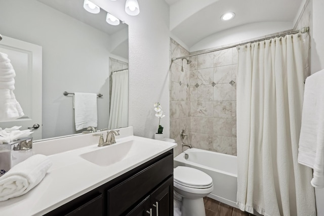 632 Dunster Ln, Saginaw, TX 76131 - bathroom with vanity, toilet, shower / tub combo, and wood finished floors