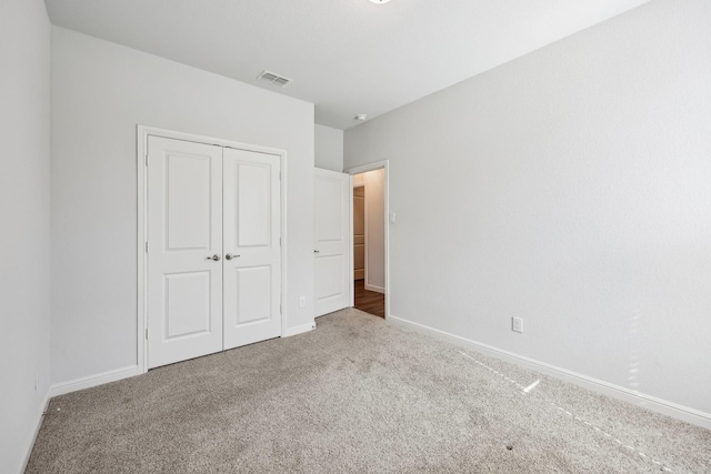 632 Dunster Ln, Saginaw, TX 76131 - unfurnished bedroom with carpet, baseboards, and a closet