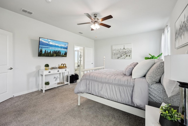 632 Dunster Ln, Saginaw, TX 76131 - carpeted bedroom featuring a ceiling fan, ensuite bathroom, and baseboards