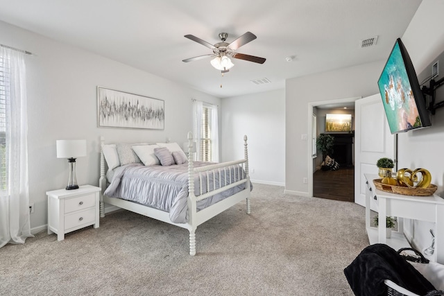 632 Dunster Ln, Saginaw, TX 76131 - bedroom featuring light colored carpet, a ceiling fan, and baseboards