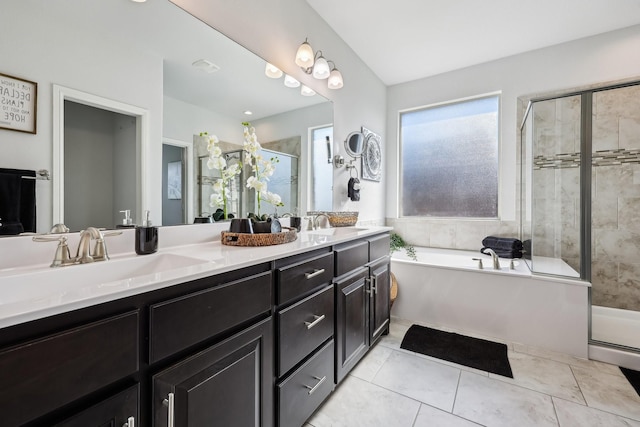 632 Dunster Ln, Saginaw, TX 76131 - full bathroom with a stall shower, double vanity, a bath, and tile patterned floors