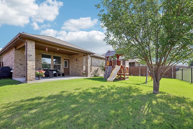 632 Dunster Ln, Saginaw, TX 76131 - view of yard featuring a playground and a patio
