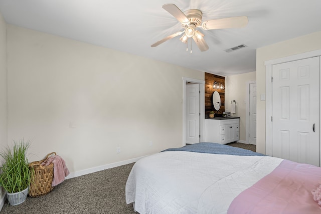 1418 Lakeshore Blvd, Oak Point, TX 75068 - bedroom featuring dark carpet, baseboards, a ceiling fan, and connected bathroom