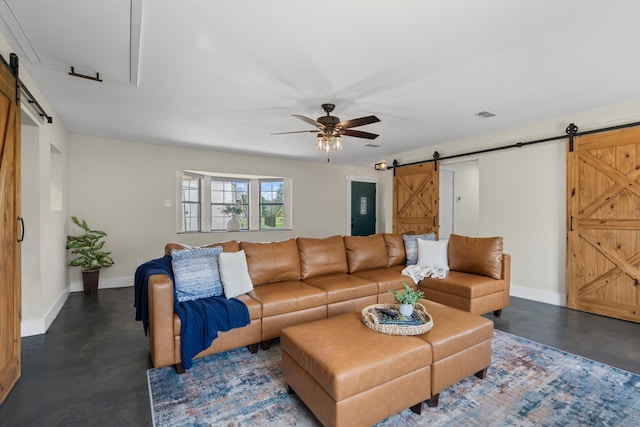 1418 Lakeshore Blvd, Oak Point, TX 75068 - living room featuring a barn door, finished concrete floors, baseboards, and ceiling fan