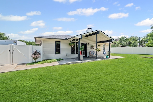 1418 Lakeshore Blvd, Oak Point, TX 75068 - rear view of house with a gate, a chimney, and a patio