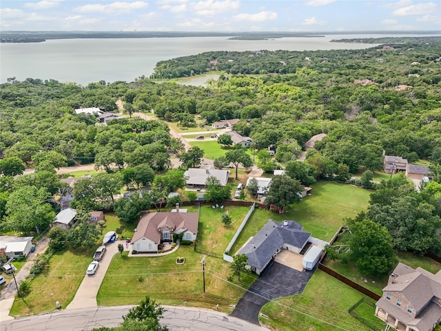 1418 Lakeshore Blvd, Oak Point, TX 75068 - aerial overview of property's location with a large body of water, nearby suburban area, and a forest