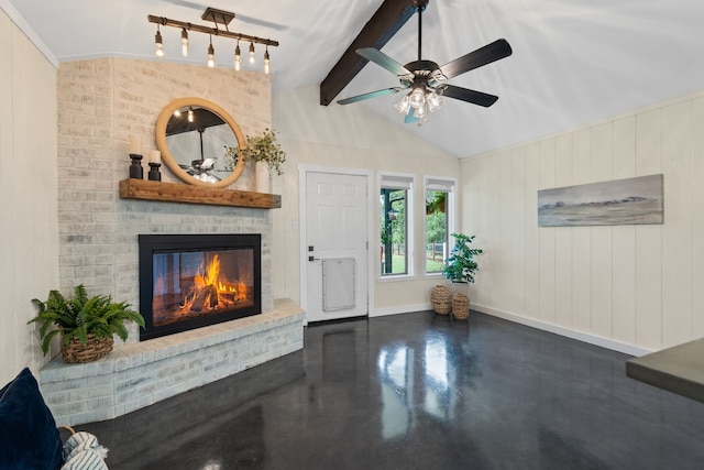 1418 Lakeshore Blvd, Oak Point, TX 75068 - living area featuring a fireplace, finished concrete flooring, ceiling fan, and baseboards