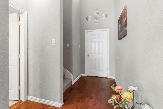 316 Tallgrass Ln, Plano, TX 75023 - hall featuring wood finished floors, baseboards, and stairs