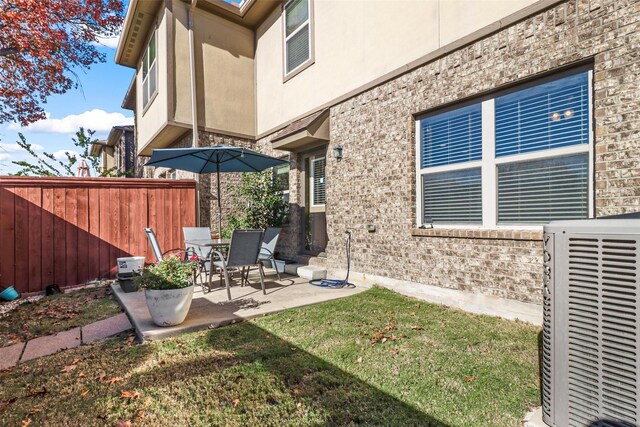 316 Tallgrass Ln, Plano, TX 75023 - view of yard featuring central AC and a patio