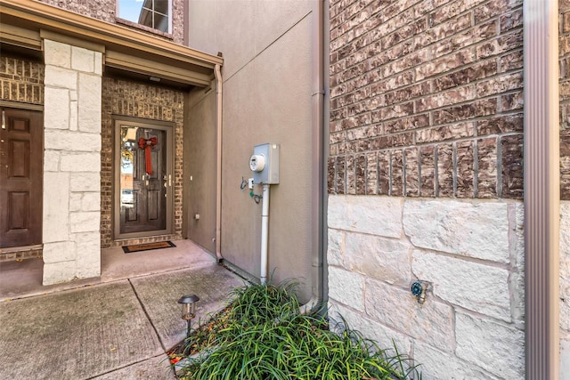 316 Tallgrass Ln, Plano, TX 75023 - property entrance with stone siding