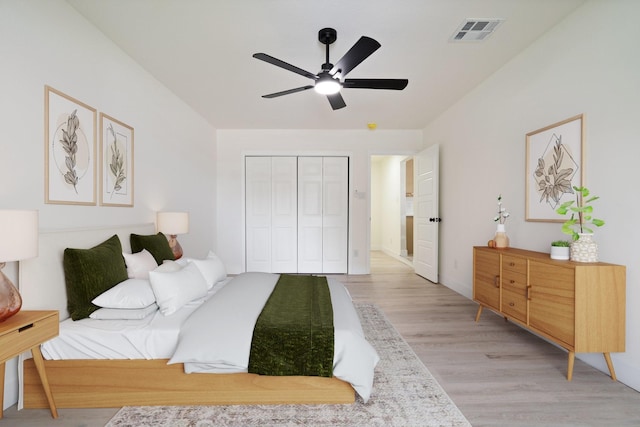 6625 Bridges Ave, Richland Hills, TX 76118 - bedroom featuring light wood-type flooring, a closet, and ceiling fan