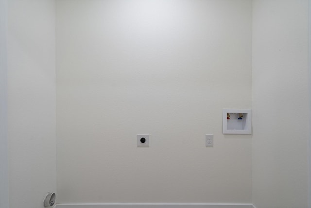 6625 Bridges Ave, Richland Hills, TX 76118 - laundry room featuring hookup for an electric dryer, washer hookup, and baseboards