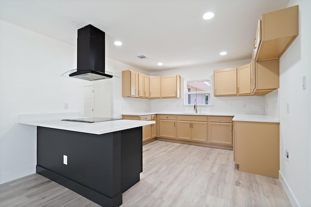 6625 Bridges Ave, Richland Hills, TX 76118 - kitchen with extractor fan, a sink, light brown cabinets, a peninsula, and light wood finished floors