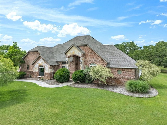 170 Paradise Canyon Cir, Paradise, TX 76073 - french country inspired facade featuring brick siding, a front lawn, a shingled roof, and stone siding