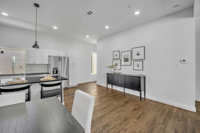 5806 Bryan Pkwy Unit 4, Dallas, TX 75206 - dining space featuring recessed lighting, wood finished floors, and baseboards