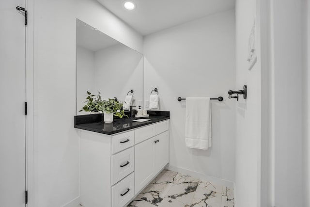 5806 Bryan Pkwy Unit 4, Dallas, TX 75206 - bathroom featuring marble finish floors, vanity, baseboards, and recessed lighting