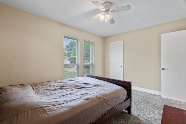 1413 Rockbrook St, Lancaster, TX 75134 - carpeted bedroom with baseboards and ceiling fan