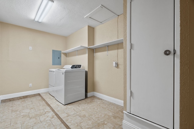 1413 Rockbrook St, Lancaster, TX 75134 - laundry area with separate washer and dryer, electric panel, a textured ceiling, attic access, and baseboards