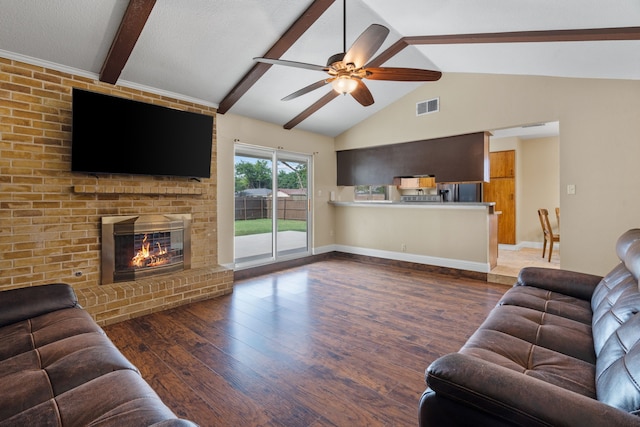 1413 Rockbrook St, Lancaster, TX 75134 - living room featuring ceiling fan, wood finished floors, and a fireplace