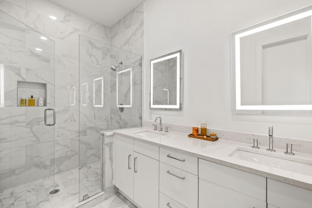 1928 Kearney Ct, Dallas, TX 75204 - full bathroom with marble look tiles, double vanity, and a marble finish shower