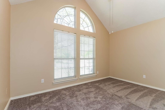 665 Cardinal Ridge Rd, Burleson, TX 76028 - empty room featuring carpet floors, high vaulted ceiling, and baseboards