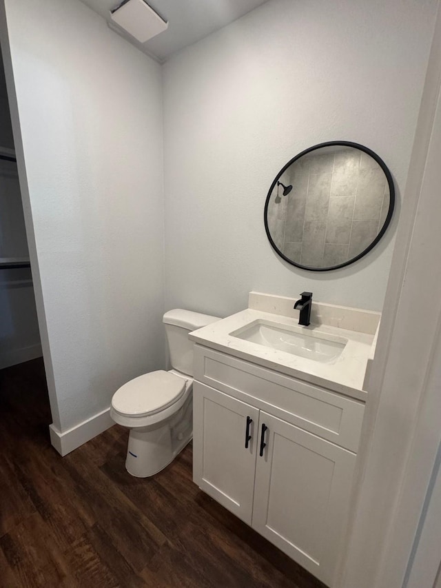 120 Live Oak Dr, Sanctuary, TX 76020 - bathroom featuring wood finished floors, vanity, toilet, and baseboards