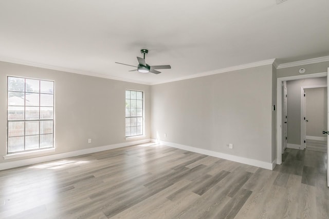 1103 Teakwood Dr, Duncanville, TX 75137 - empty room featuring ceiling fan, ornamental molding, baseboards, and light wood-type flooring