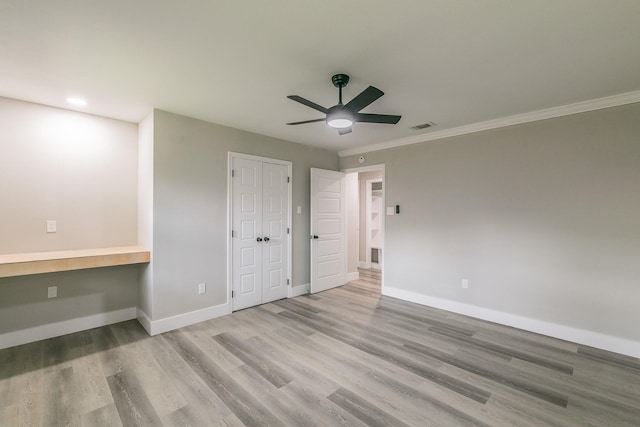 1103 Teakwood Dr, Duncanville, TX 75137 - unfurnished bedroom with wood finished floors, baseboards, ornamental molding, ceiling fan, and recessed lighting